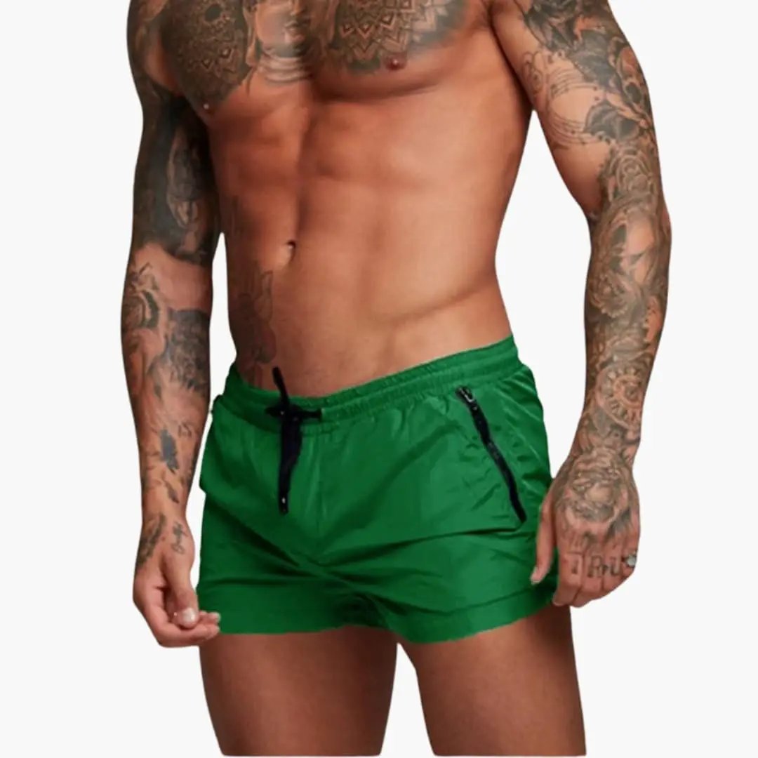 Men’s Shorts by Wilfred Smith, green jogger shorts with elastic waistband and zip pockets
