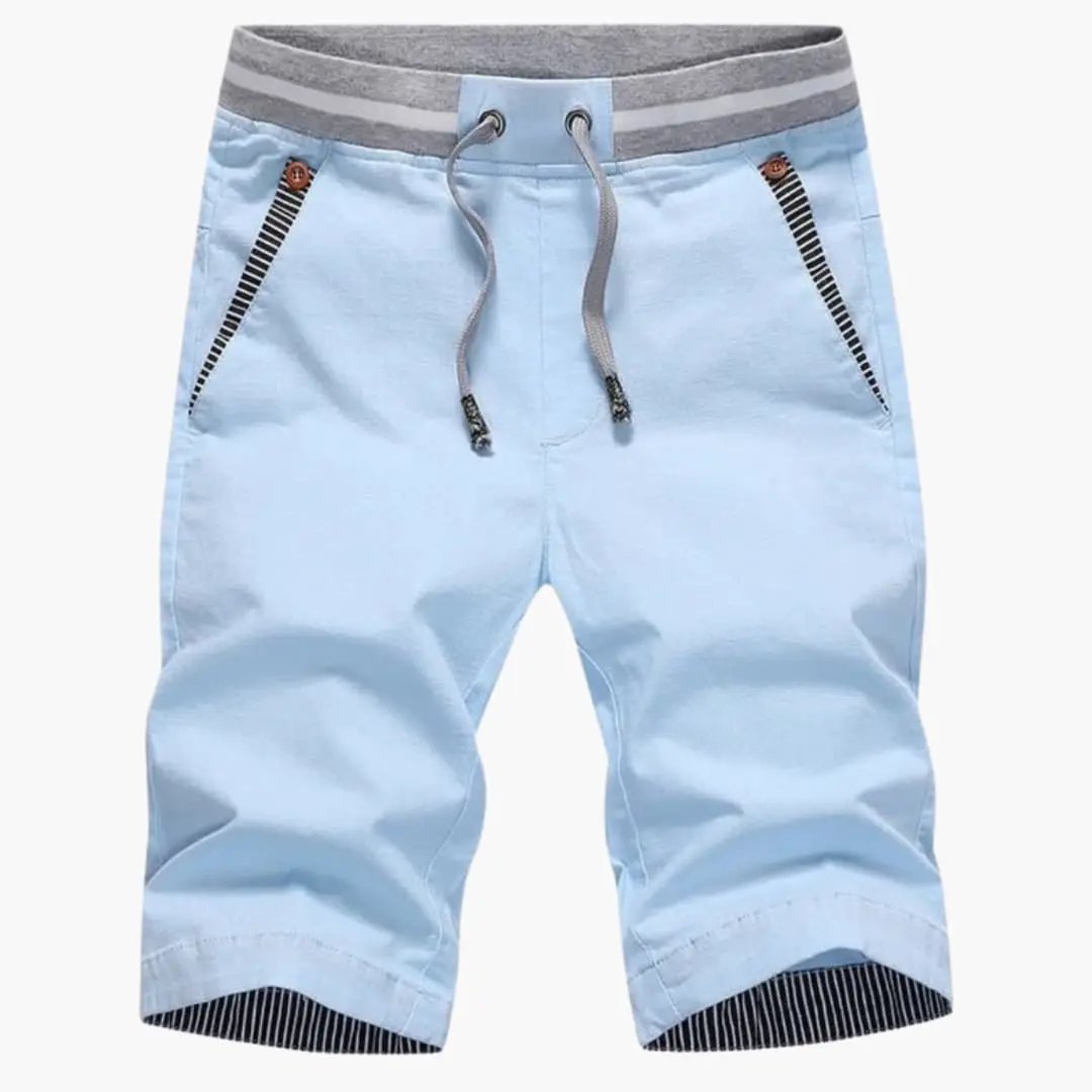 Men's light blue jogger shorts with elastic waistband, drawstring, and turn-up striped hems