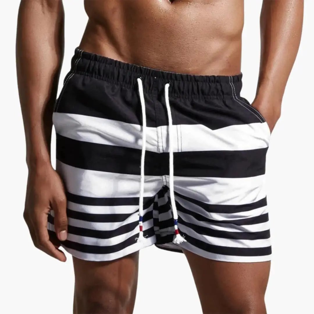 Men’s swim shorts by Wilfred Smith, black and white striped boardshorts with drawstring