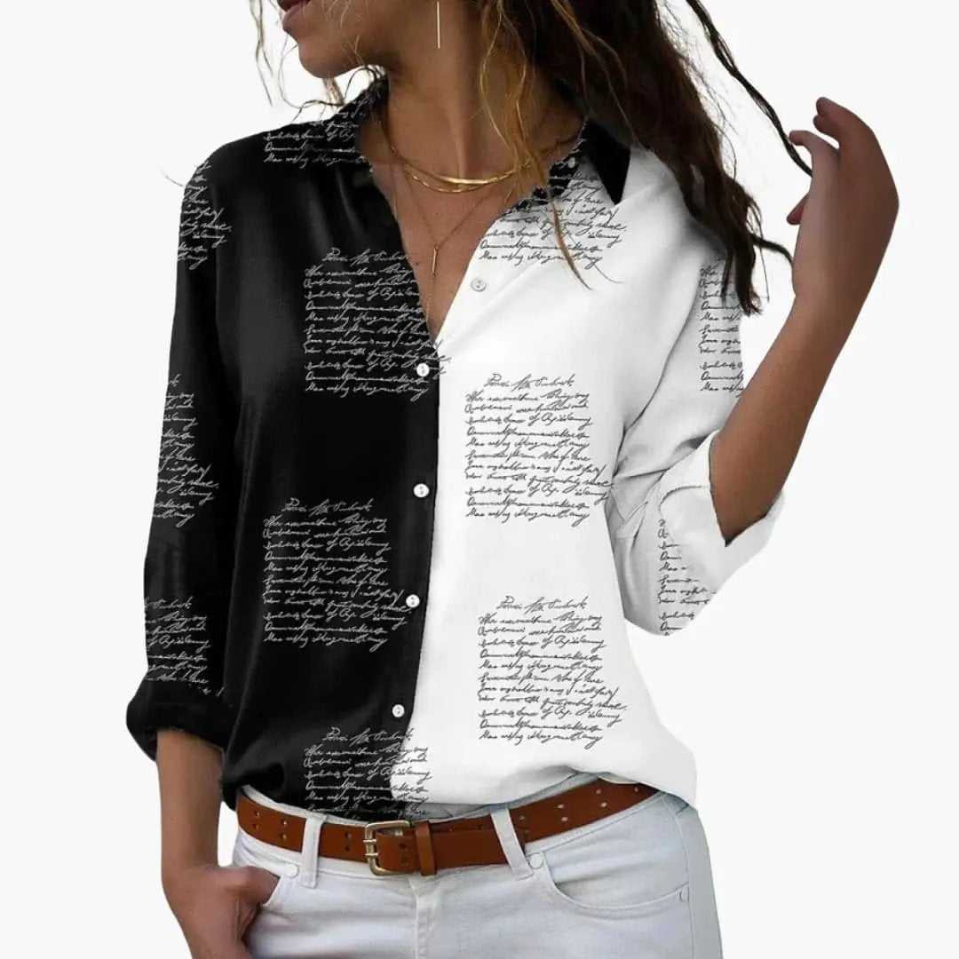 Blouse by Wilfred Smith with black-and-white split design and handwritten script print