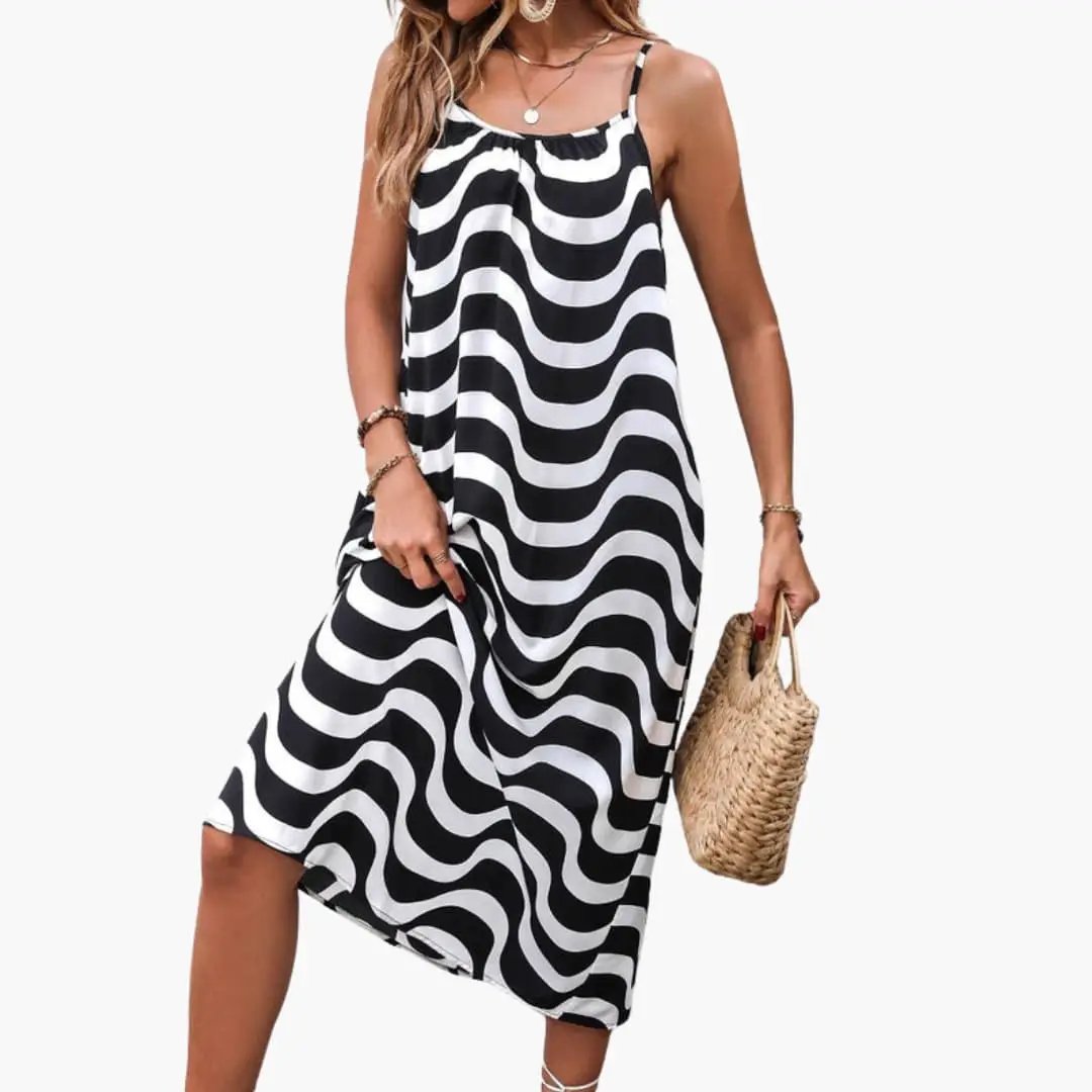 Women's beach dress with spaghetti straps and black-and-white wave pattern