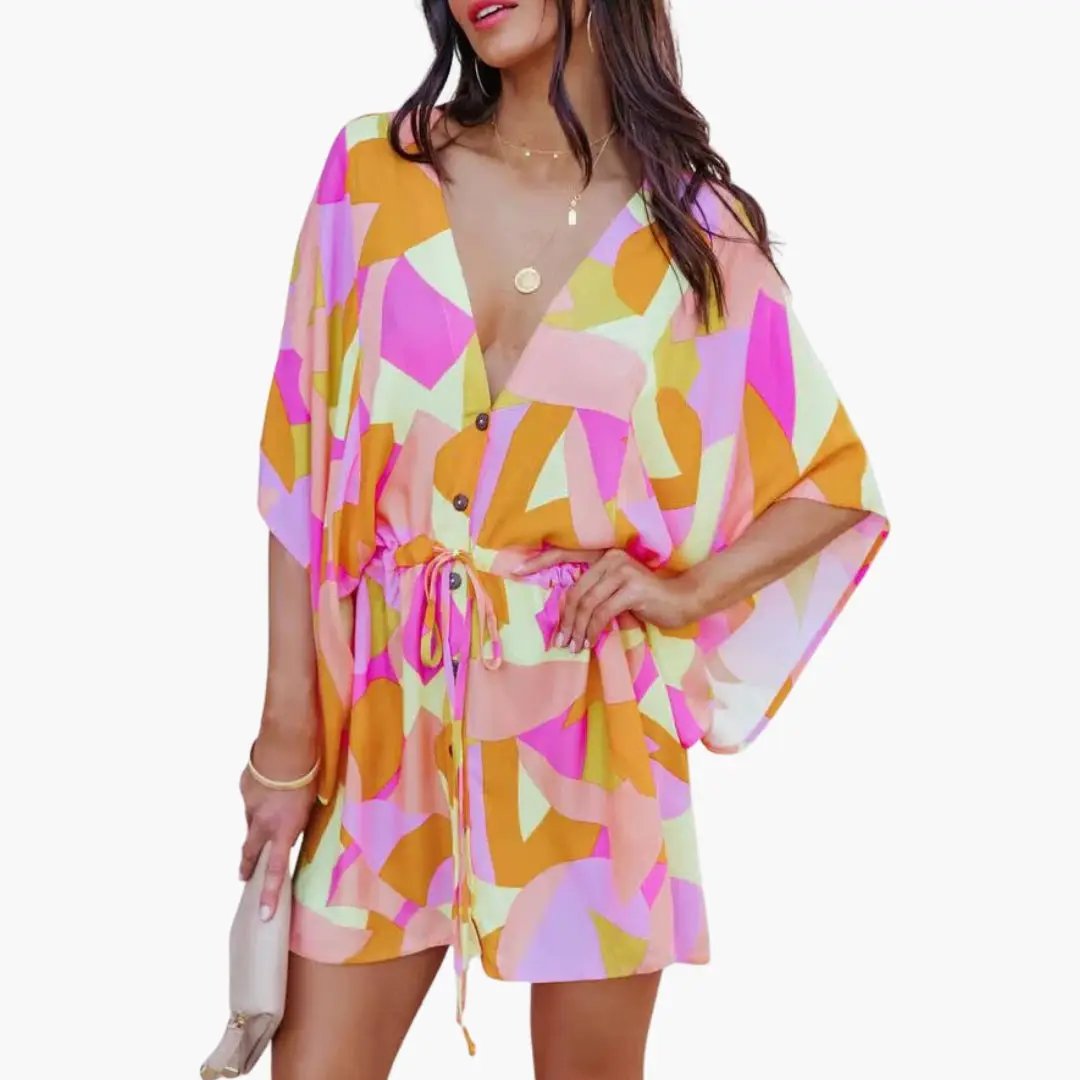 Women's beach dress by Wilfred Smith in bright multicolor geometric print with waist tie and button front