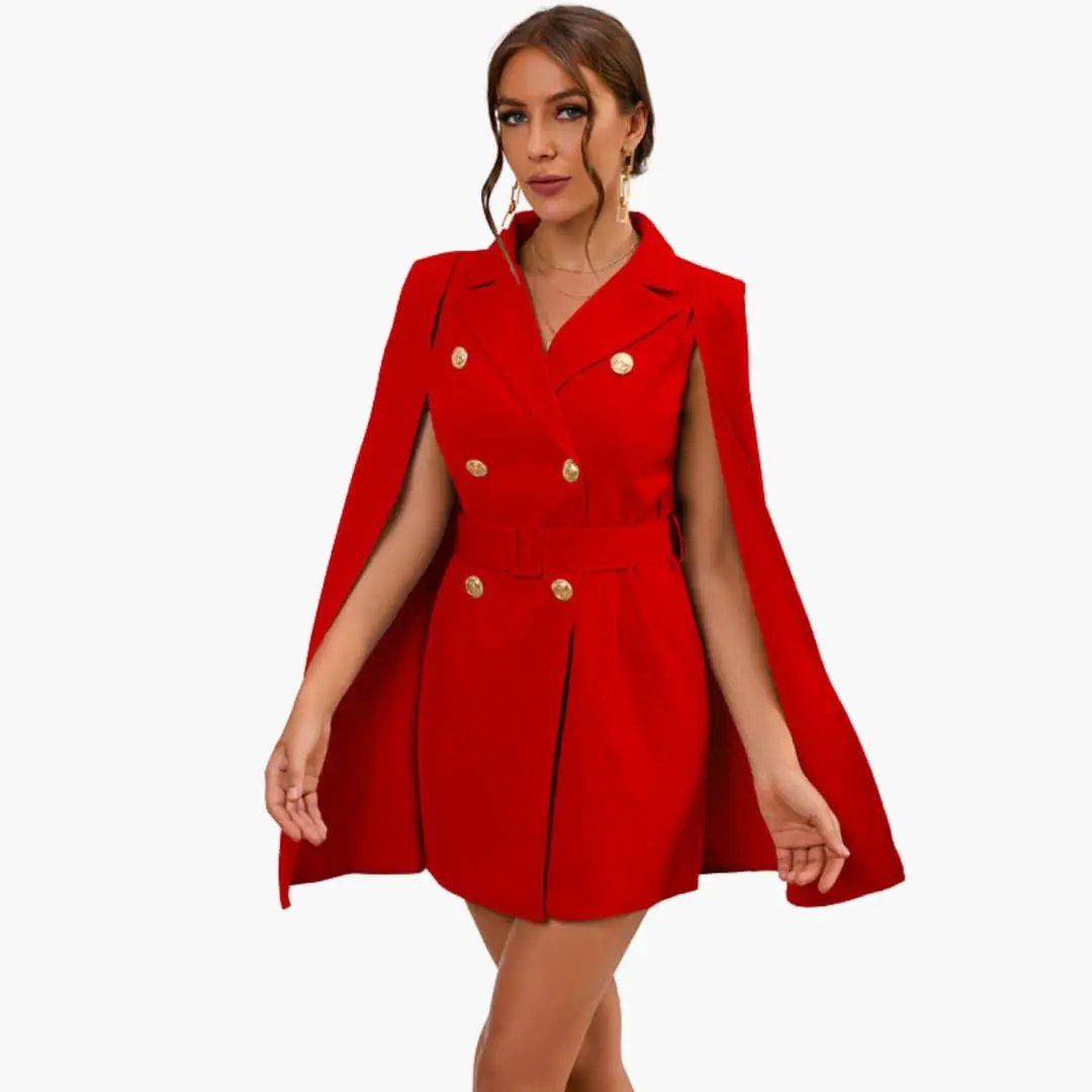 Women's red blazer dress with gold button details and belted waist with cape-style sleeves