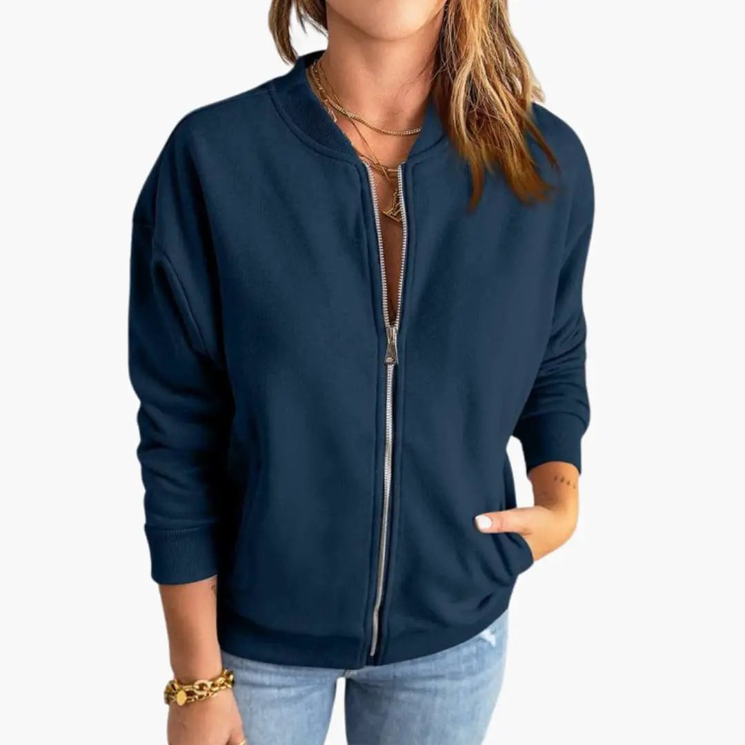 Women’s navy bomber jacket with front zipper and slim fit.