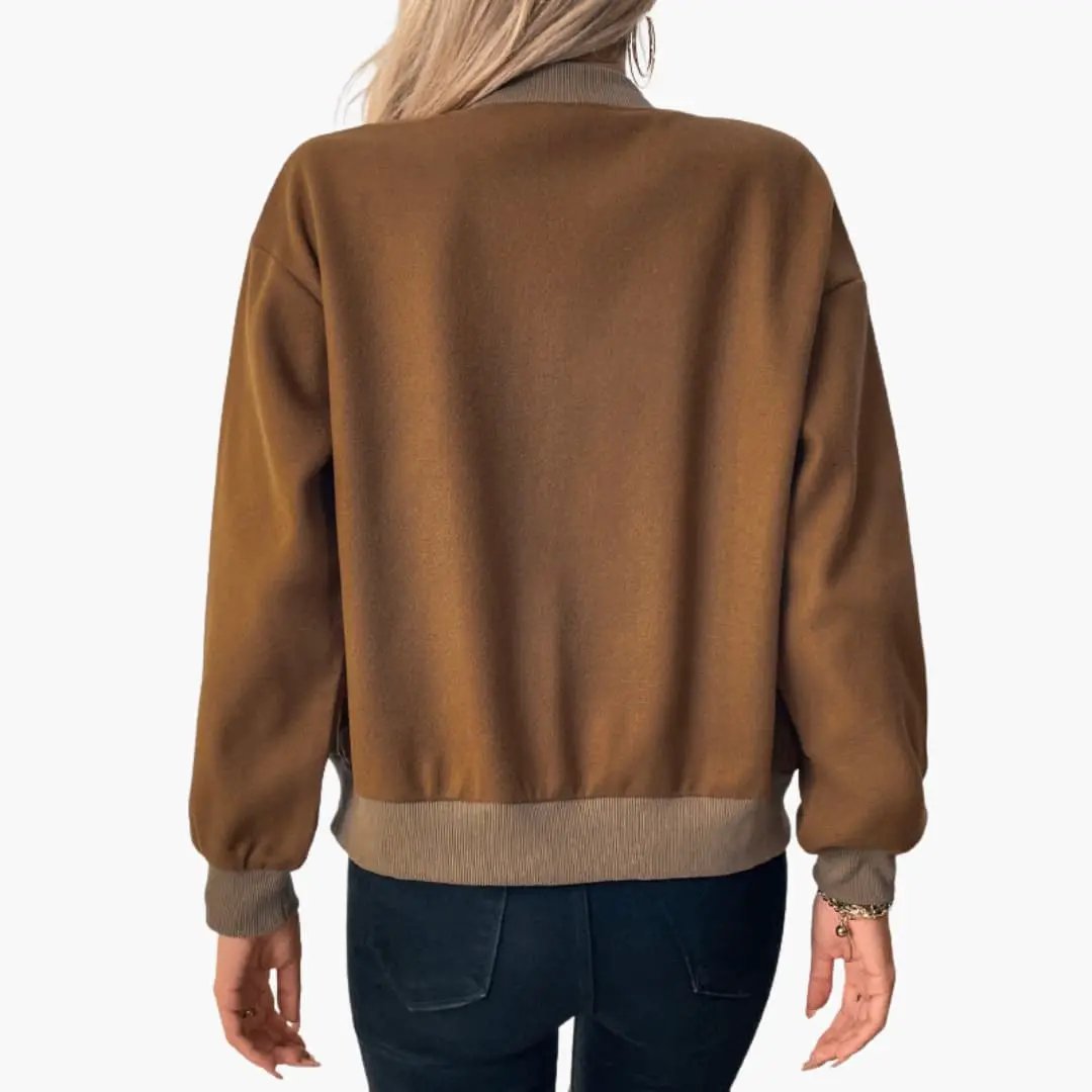 Women's bomber jacket in brown with beige ribbed cuffs and hem, back view.