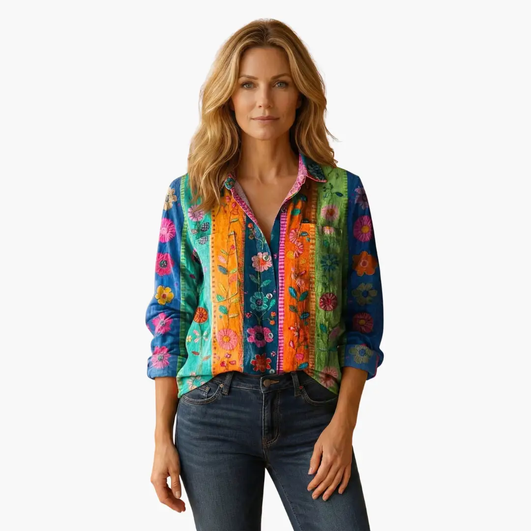 Women's button-down shirt with a classic collar and long sleeves in vibrant multicolor floral patchwork.