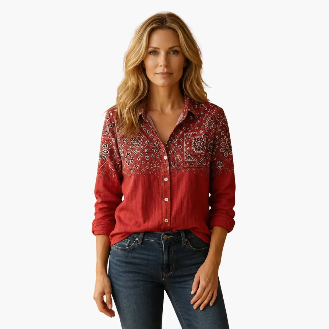 Women's red button-down shirt with classic collar and long sleeves featuring a paisley bandana print.