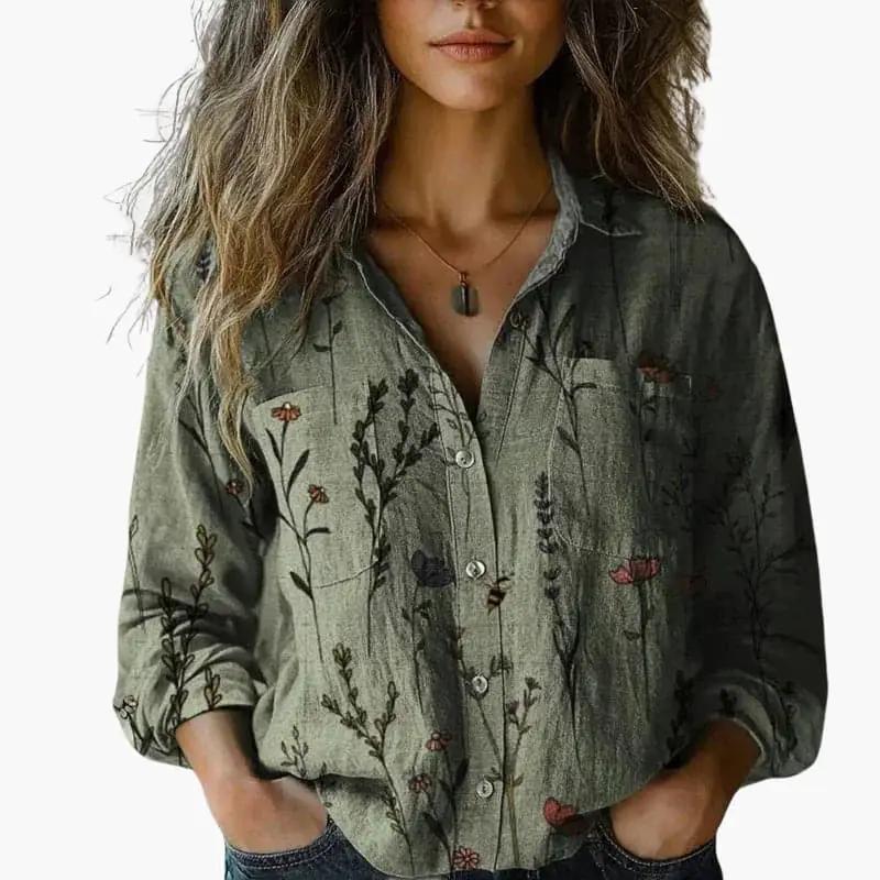 Women's button-down shirt with classic collar and long sleeves in olive-green botanical print.