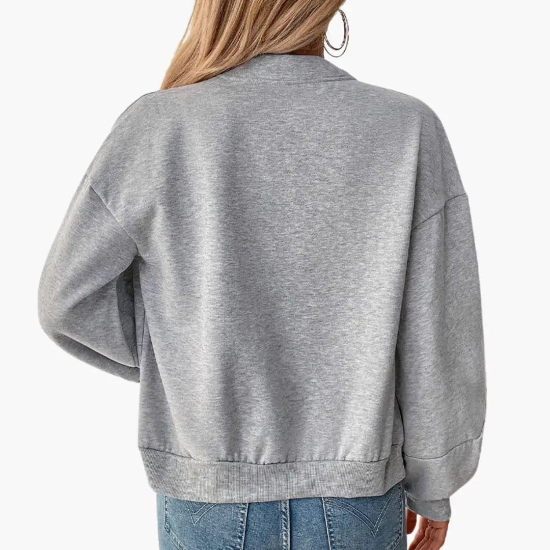 Women’s oversized gray heather bomber jacket with voluminous sleeves and ribbed hem, back view
