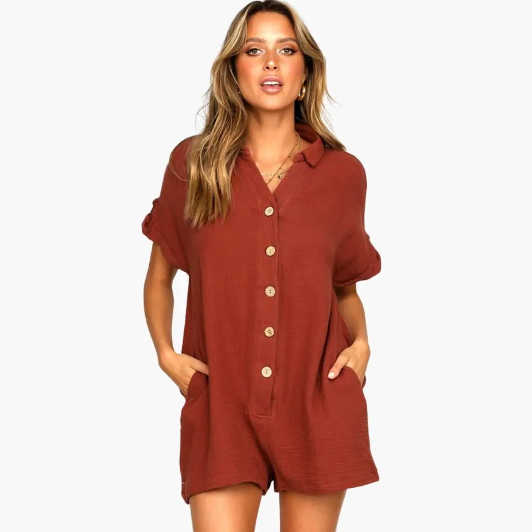 Women's Jumpsuit by Wilfred Smith, rust-colored collared button-front with rolled sleeves and pockets.