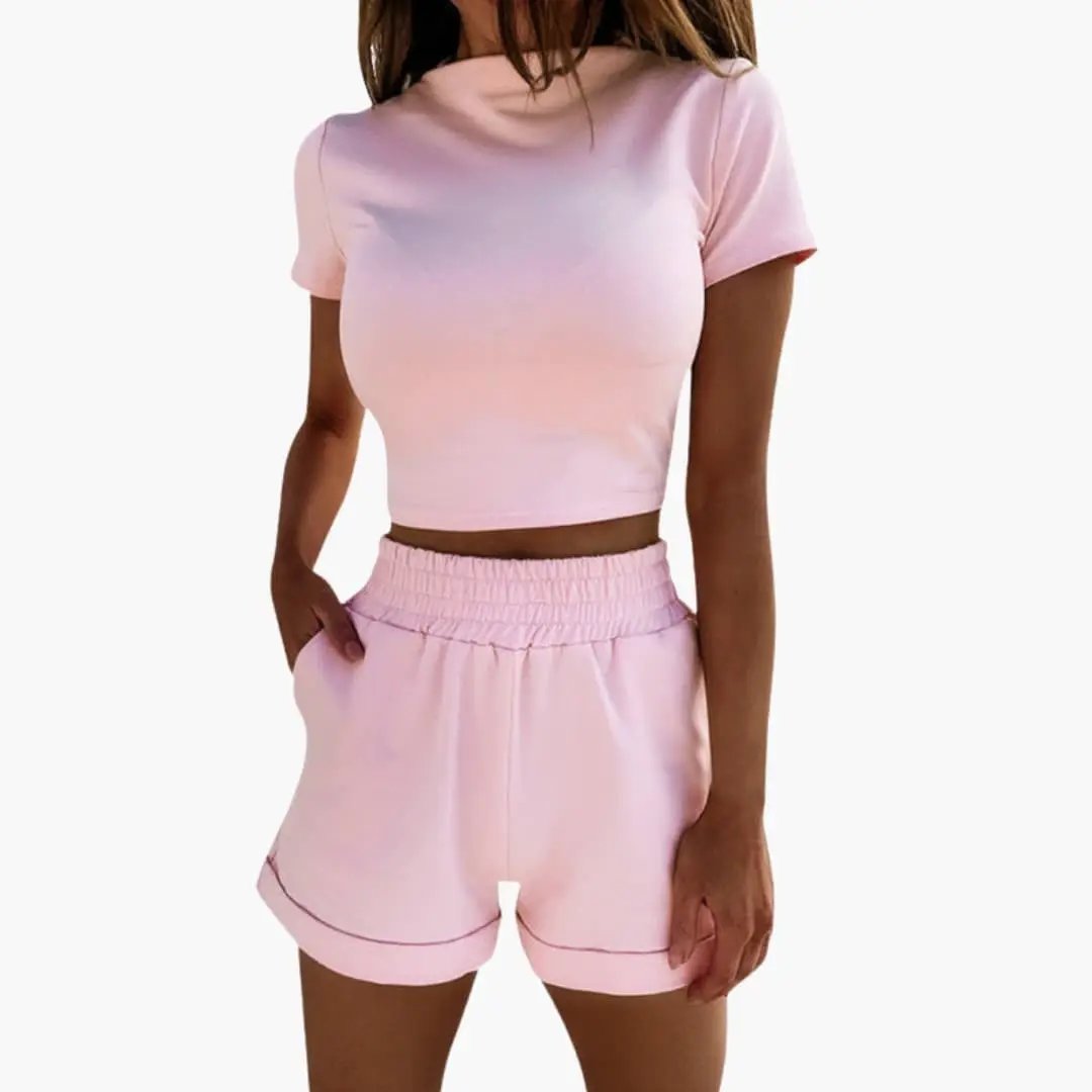 Women's two-piece set: pink crop top and elastic-waist shorts by Wilfred Smith