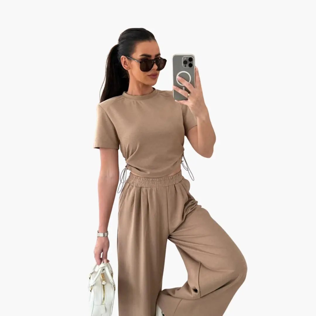 Women's two-piece tan set: crop top with side drawstrings and matching wide-leg jogger pants for a coordinated casual.