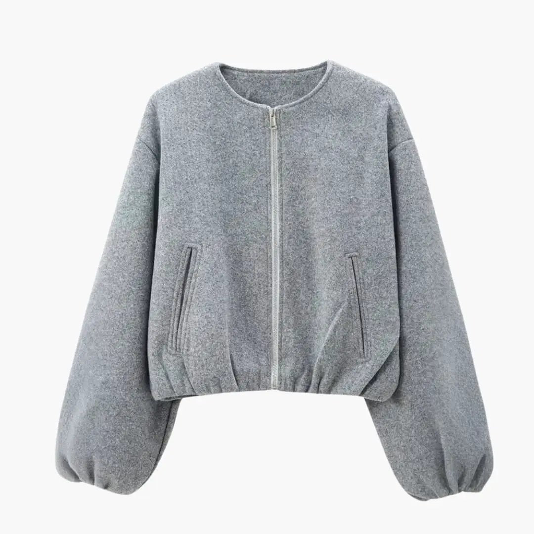 Women’s cropped bomber jacket with zipper closure in light gray fleece, puffed long sleeves and front zip pockets.