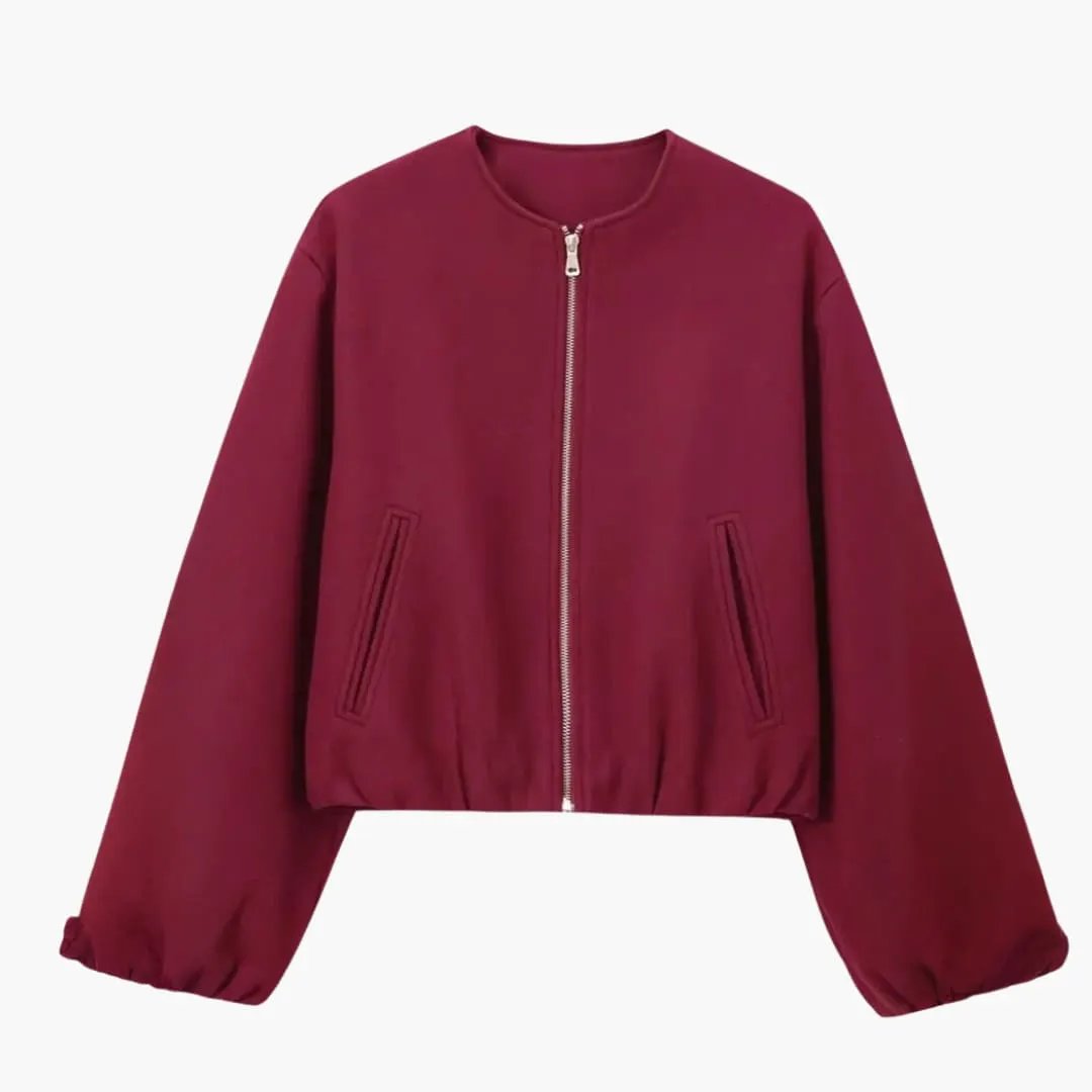Women's cropped bomber jacket by Wilfred Smith in burgundy with zipper closure