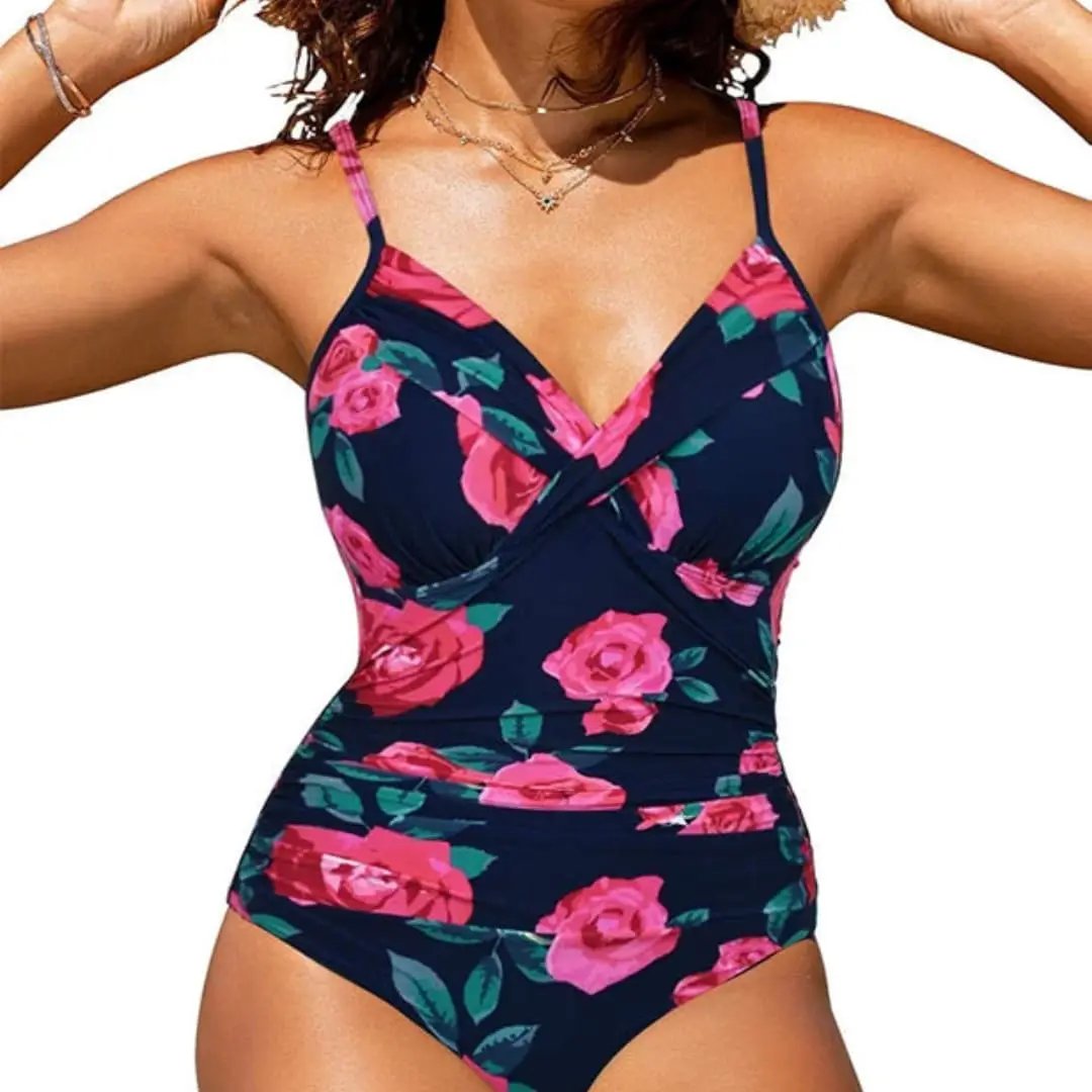 Women’s Cross-Front Backless One-Piece Swimsuit by Wilfred Smith, navy with pink rose print.
