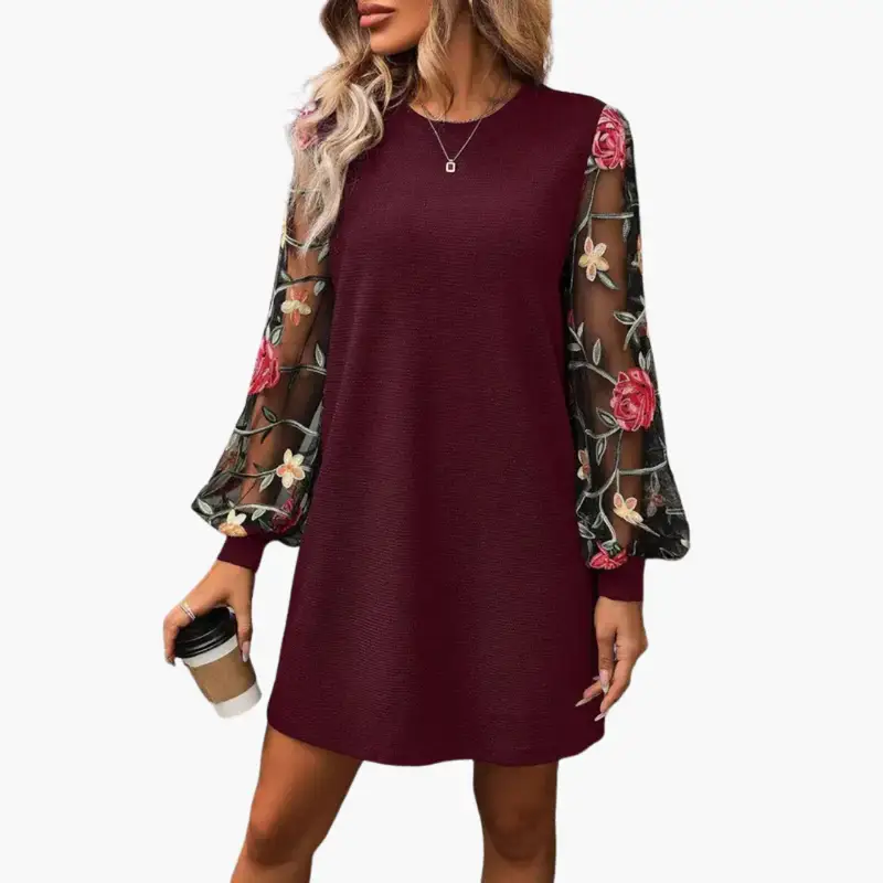 Women's burgundy dress with sheer floral-embroidered sleeves and a relaxed fit.