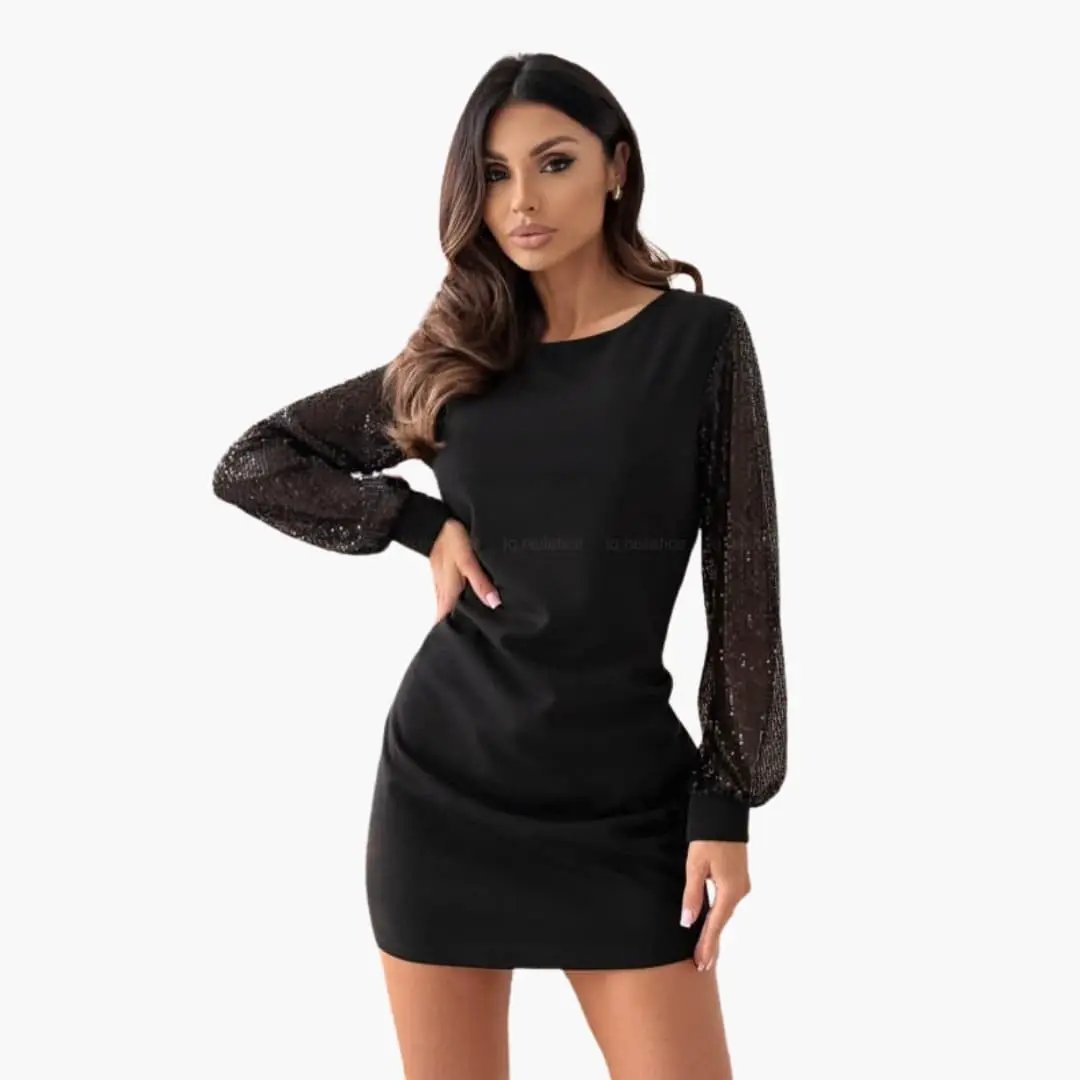Women’s dress by Wilfred Smith with long, sheer sequined sleeves in black