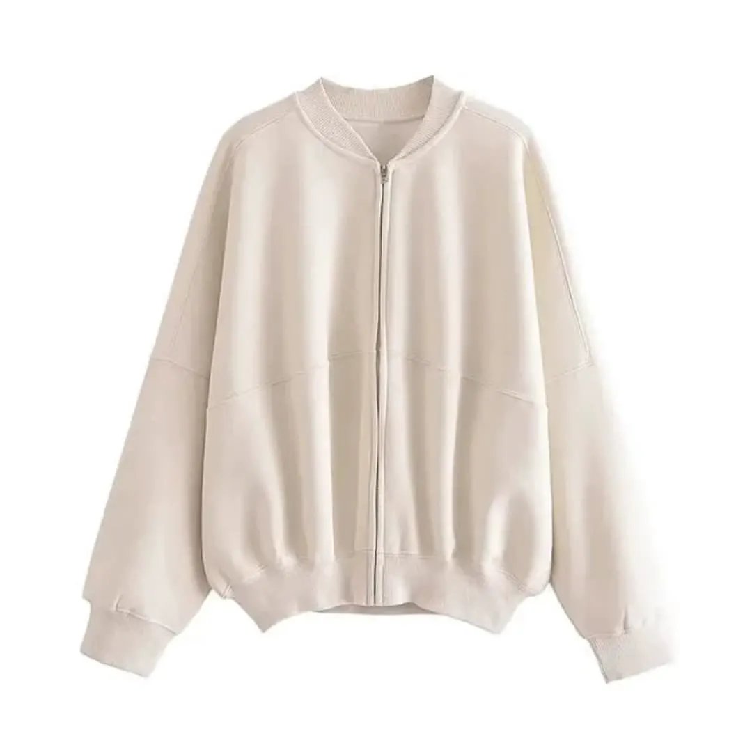 Women's fleece bomber jacket in beige with zip-front closure and ribbed cuffs.