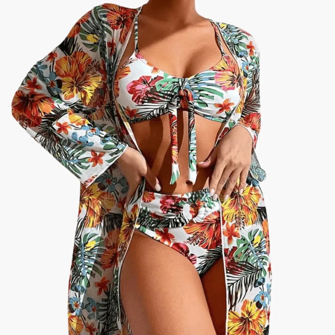 Women’s floral three-piece bikini set with matching cover-up in colorful tropical print