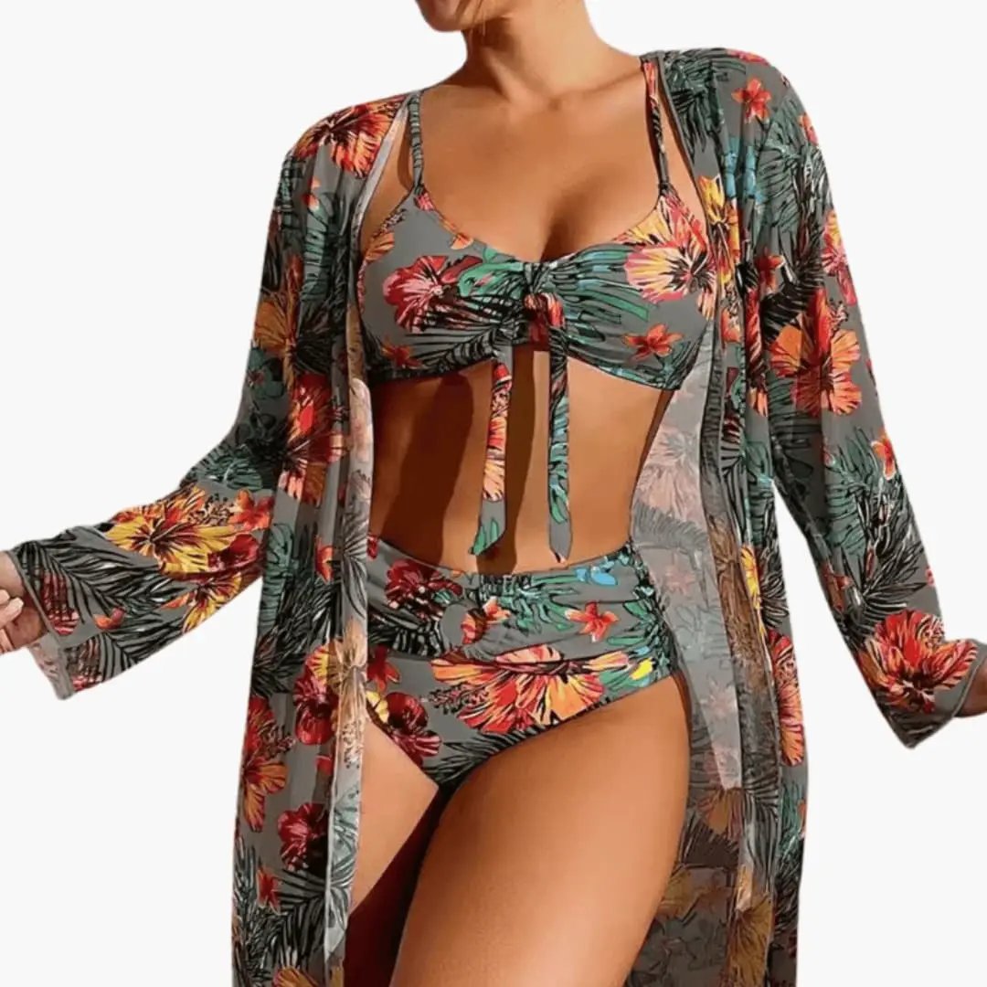 Women's floral three-piece bikini set with matching sheer cover-up in tropical grey-green print