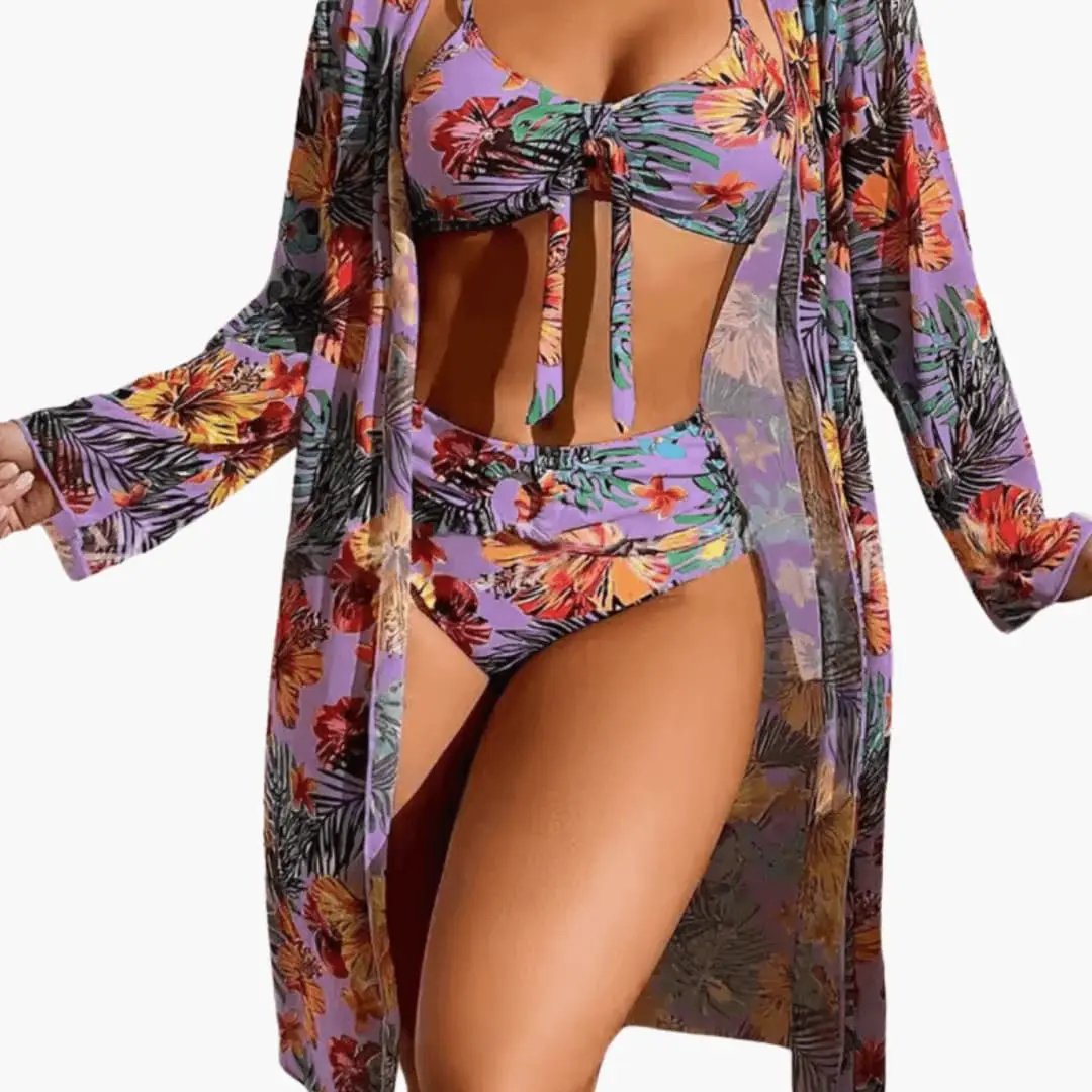 Women’s floral three-piece bikini set with matching cover-up in purple print by Wilfred Smith