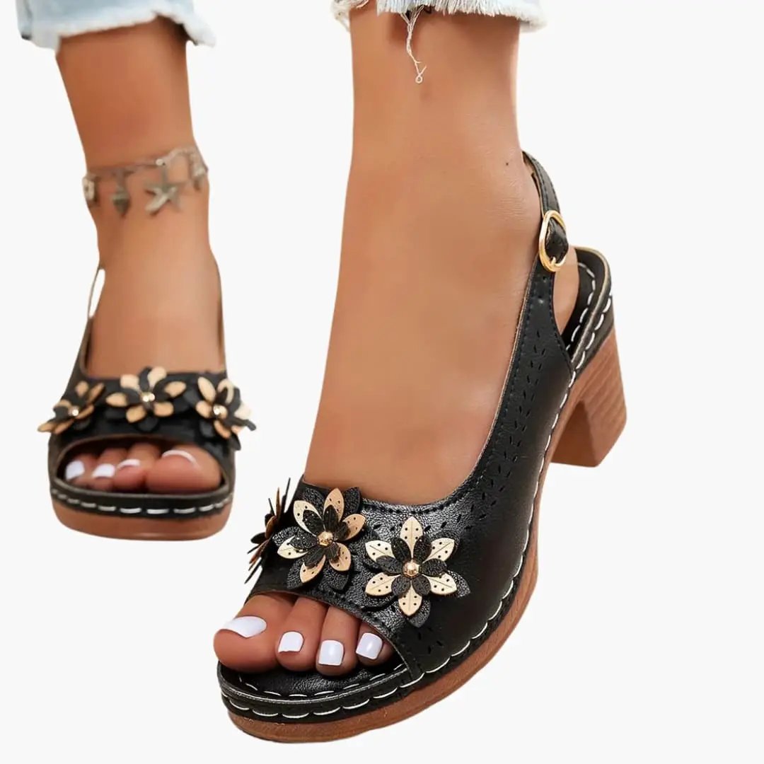 Wilfred Smith women's heeled sandals with ankle strap, black leather, floral appliqué and padded insole (2 shown)
