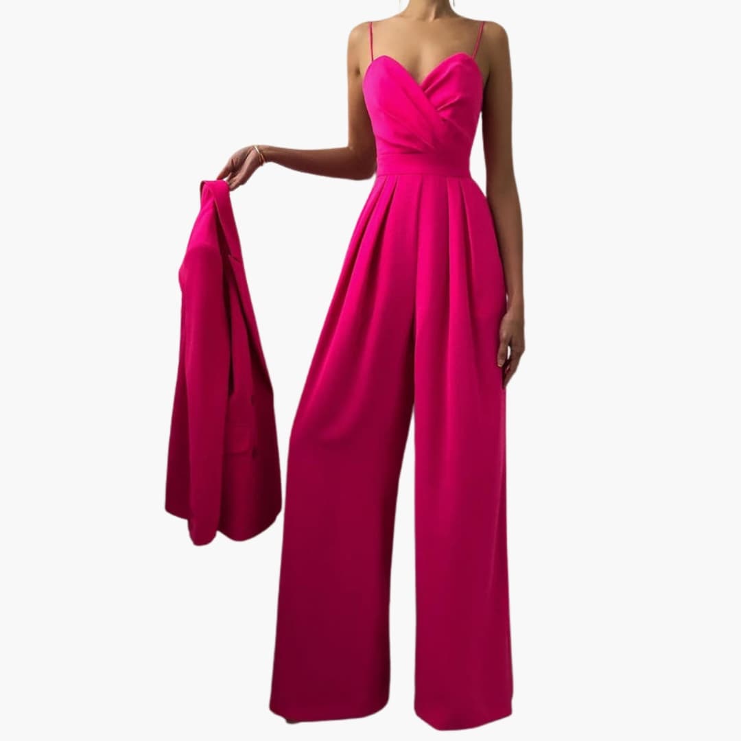 Women's high-waisted one-piece jumpsuit with spaghetti straps in bright magenta, wide-leg silhouette by Wilfred Smith