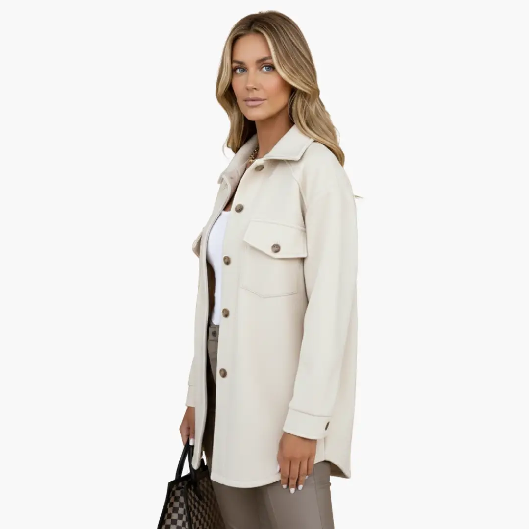 Women's jacket by Wilfred Smith in cream with front button closure and chest pockets with flaps