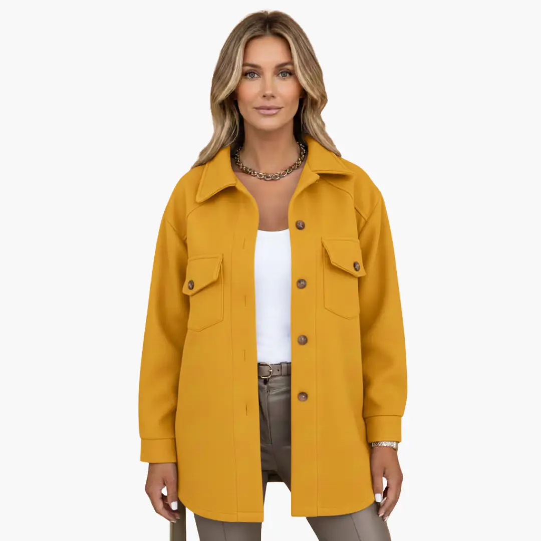 Women’s Jacket by Wilfred Smith in mustard yellow with front button closure and chest pockets.