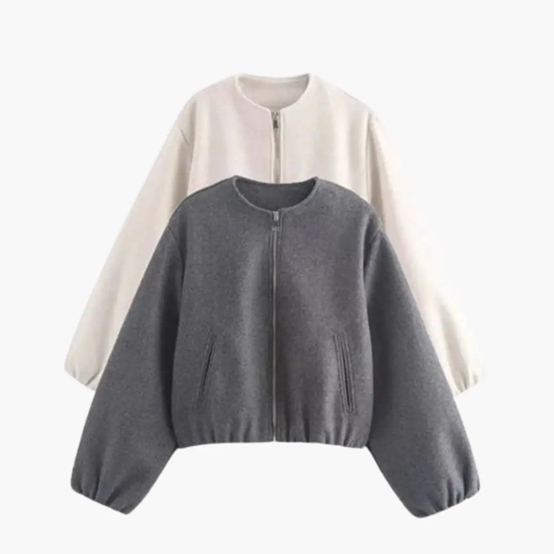 Women’s jacket with round neck and zipper closure; gray front and cream back, two jackets shown.