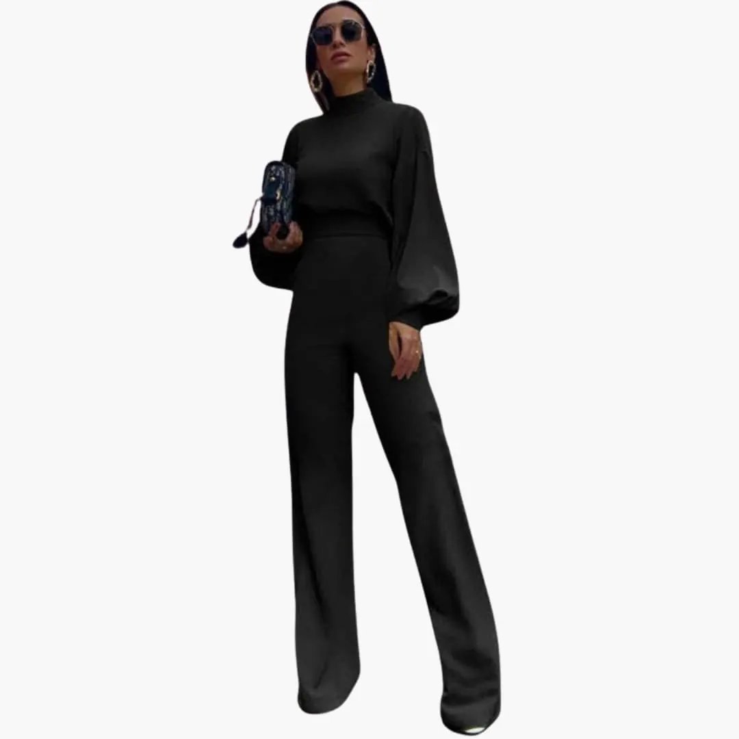 Women’s Jumpsuit by Wilfred Smith in black with half-collar neckline and long sleeves, one-piece