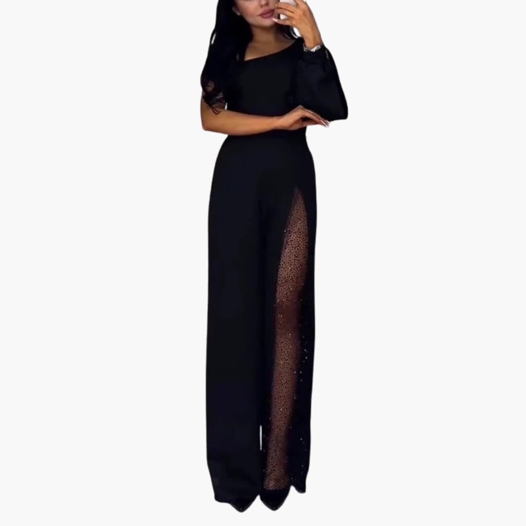 Women’s one-piece jumpsuit in black with sheer sequined leg panel and wide legs.