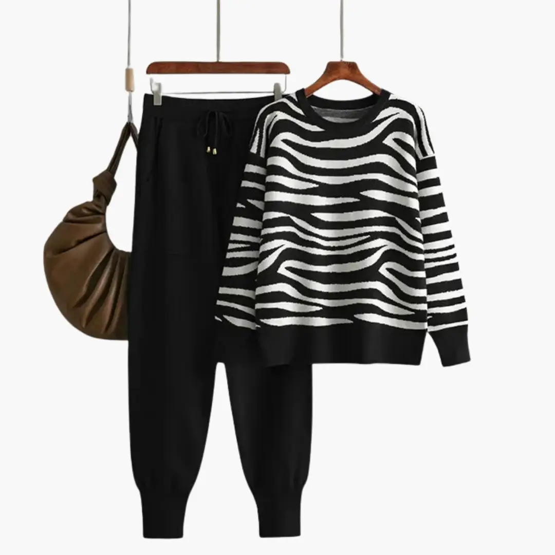 Women’s knit lounge set with striped black-and-white sweater and black joggers by Wilfred Smith