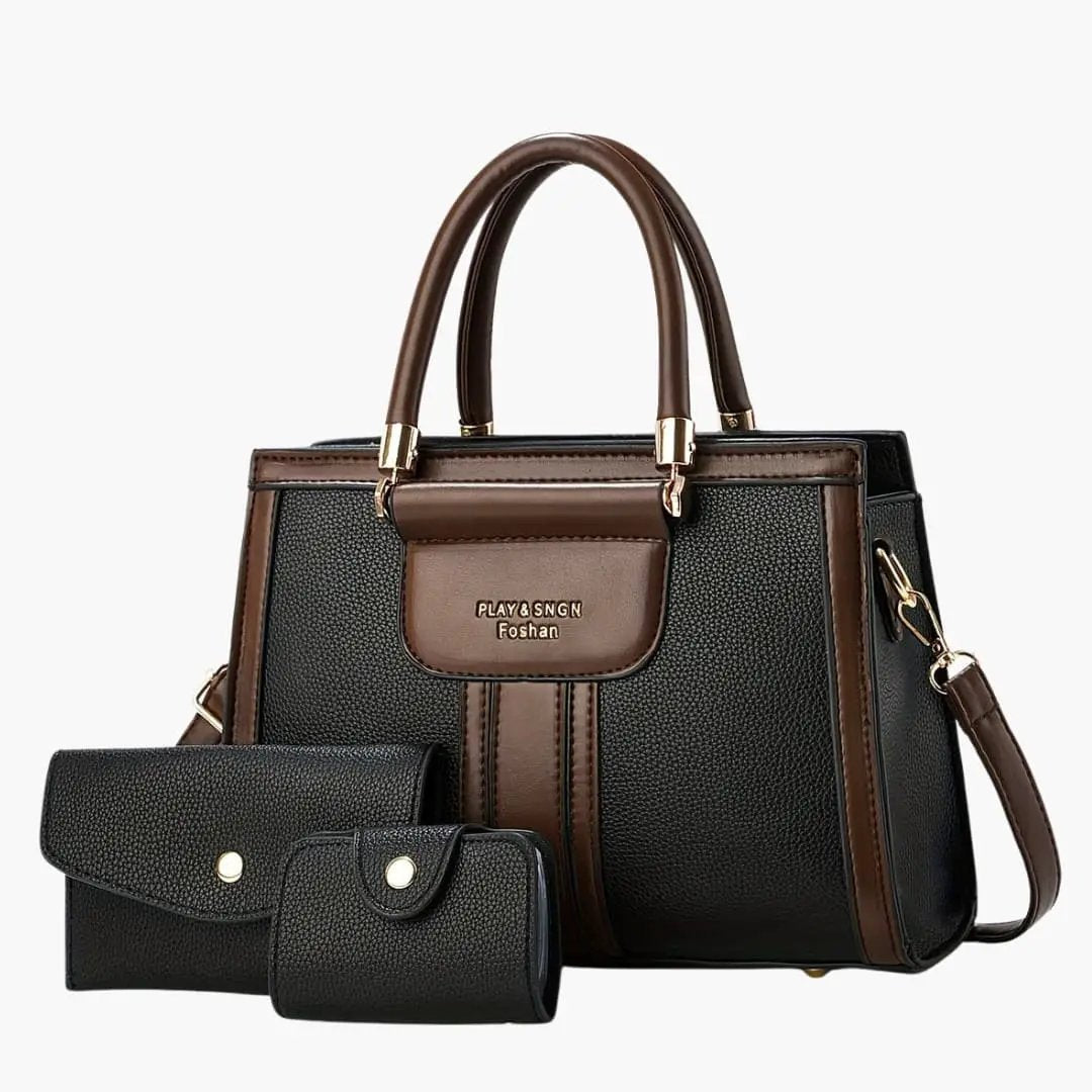 Women's Leather Shoulder Bag by Wilfred Smith with magnetic flap in black and brown; includes two wallets.