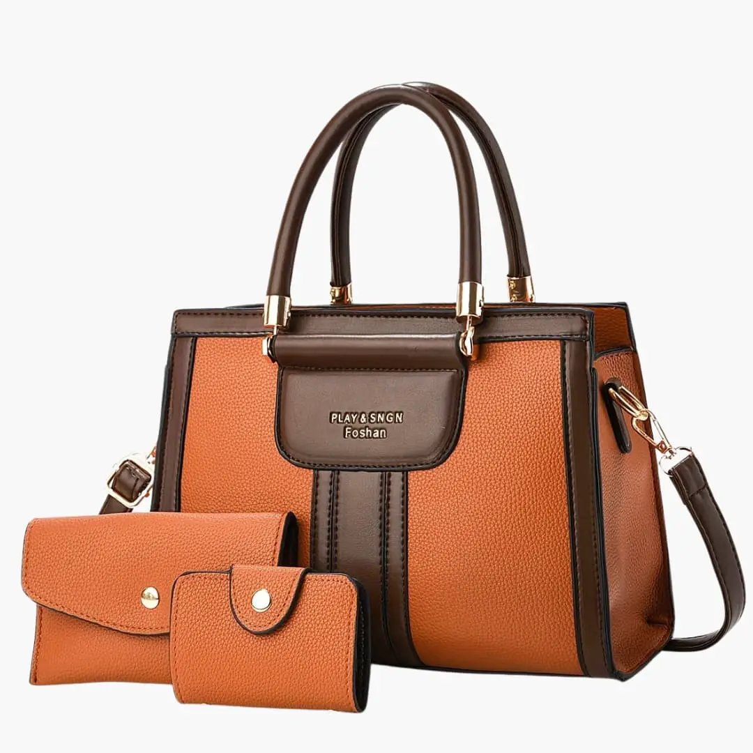 Women's leather shoulder bag with magnetic flap and adjustable strap; tan-brown panels, gold hardware; includes wallet and card holder.