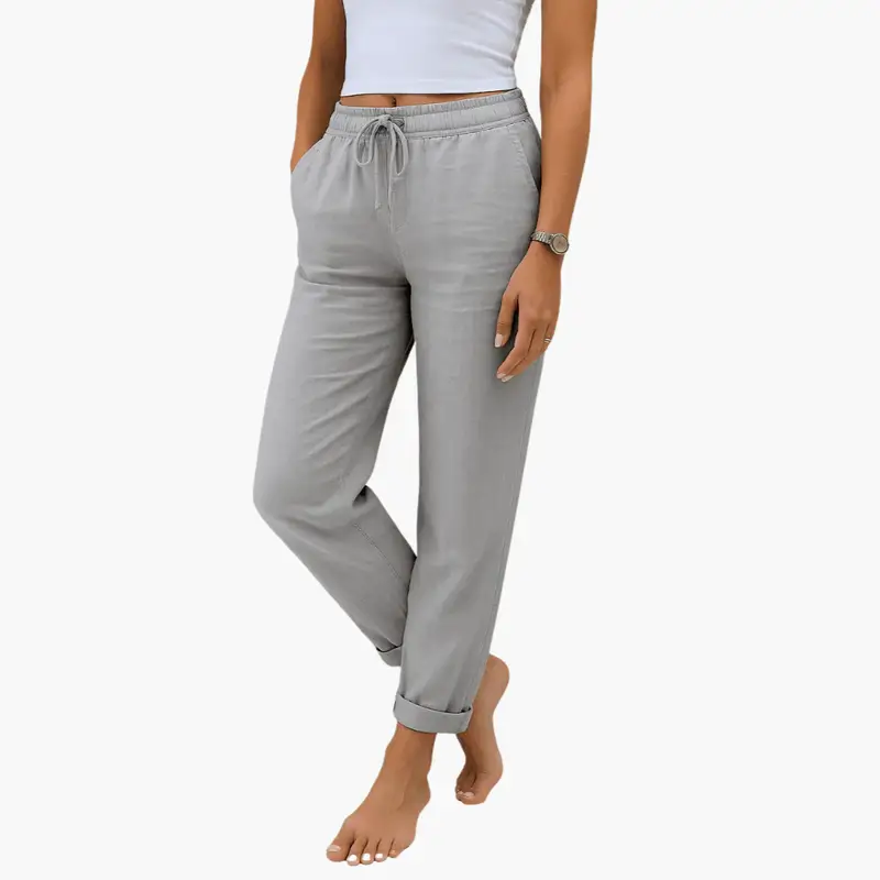 Women's Linen Pants in light gray with elastic waistband and drawstring, rolled cuffs.