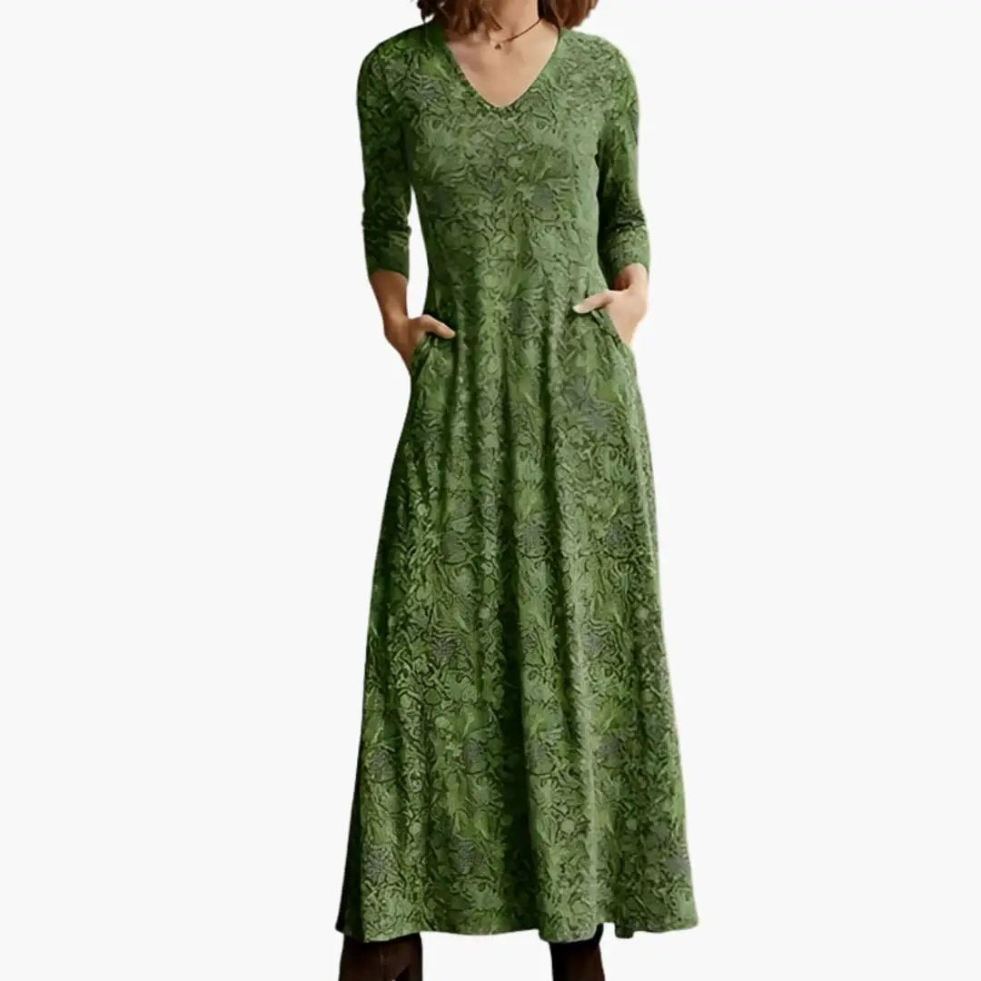 Women’s long dress in green retro lace pattern by Wilfred Smith, maxi length with long sleeves
