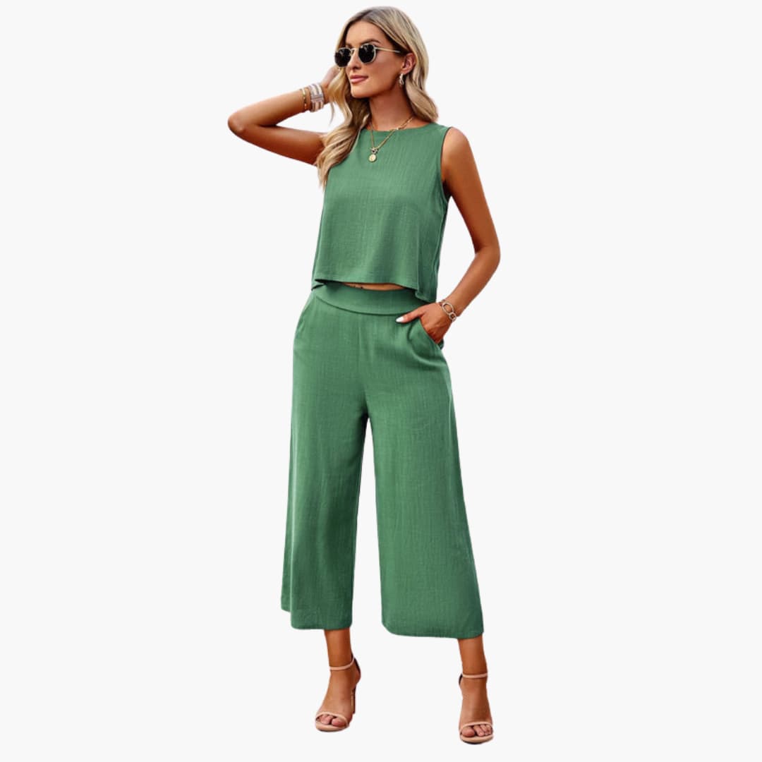 Women’s one-piece jumpsuit by Wilfred Smith in green with sleeveless top and wide-leg cropped pants
