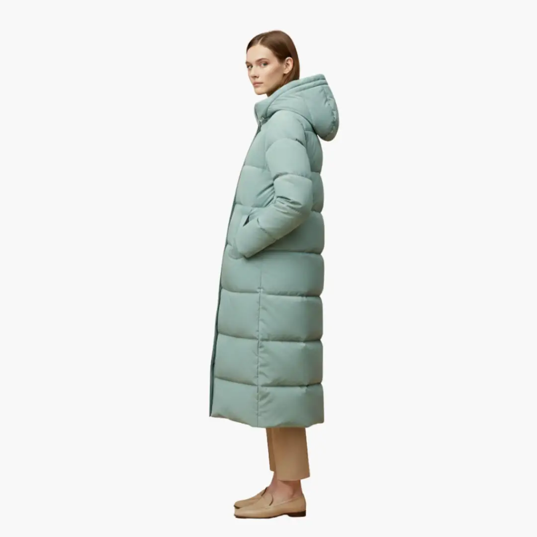 Women's long teal quilted coat with hood and button closure