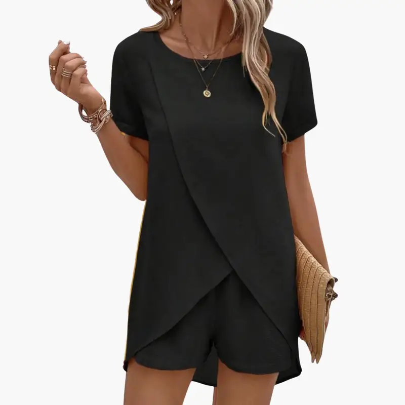 Women's black lounge set with short-sleeve top and elastic waist shorts; two-piece loungewear