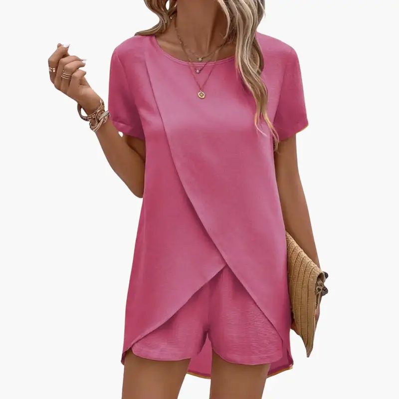 Pink two-piece loungewear set with short-sleeve top and elastic-waist shorts