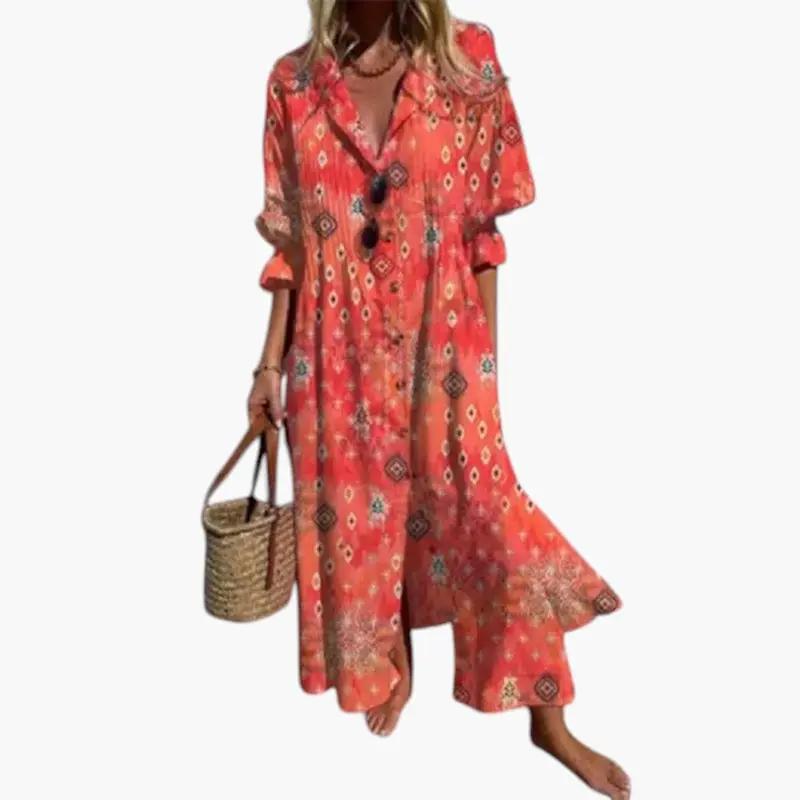Women's maxi dress, coral floral print with pockets, button-front long sleeves.
