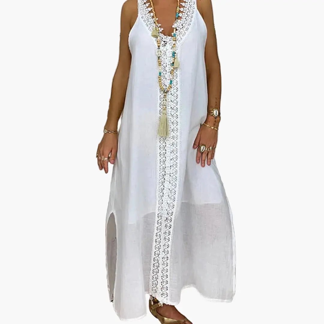 Women's white maxi dress with lace trim and side slits