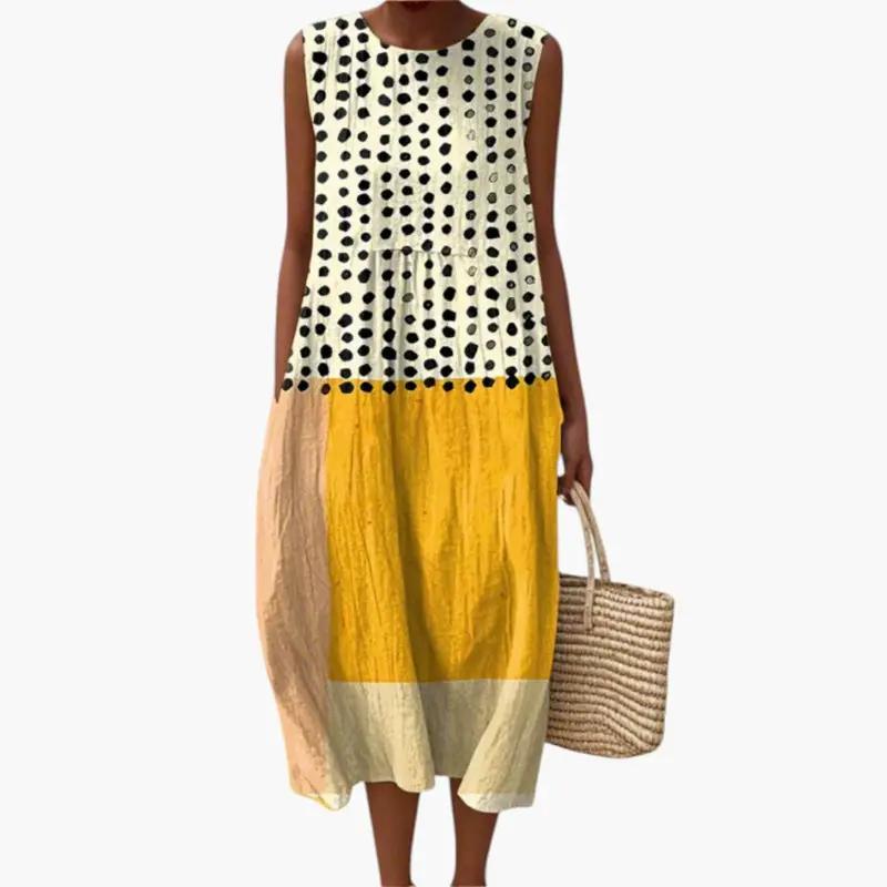 Women's midi dress by Wilfred Smith, sleeveless round-neck with polka-dot top and yellow and beige color-block skirt.