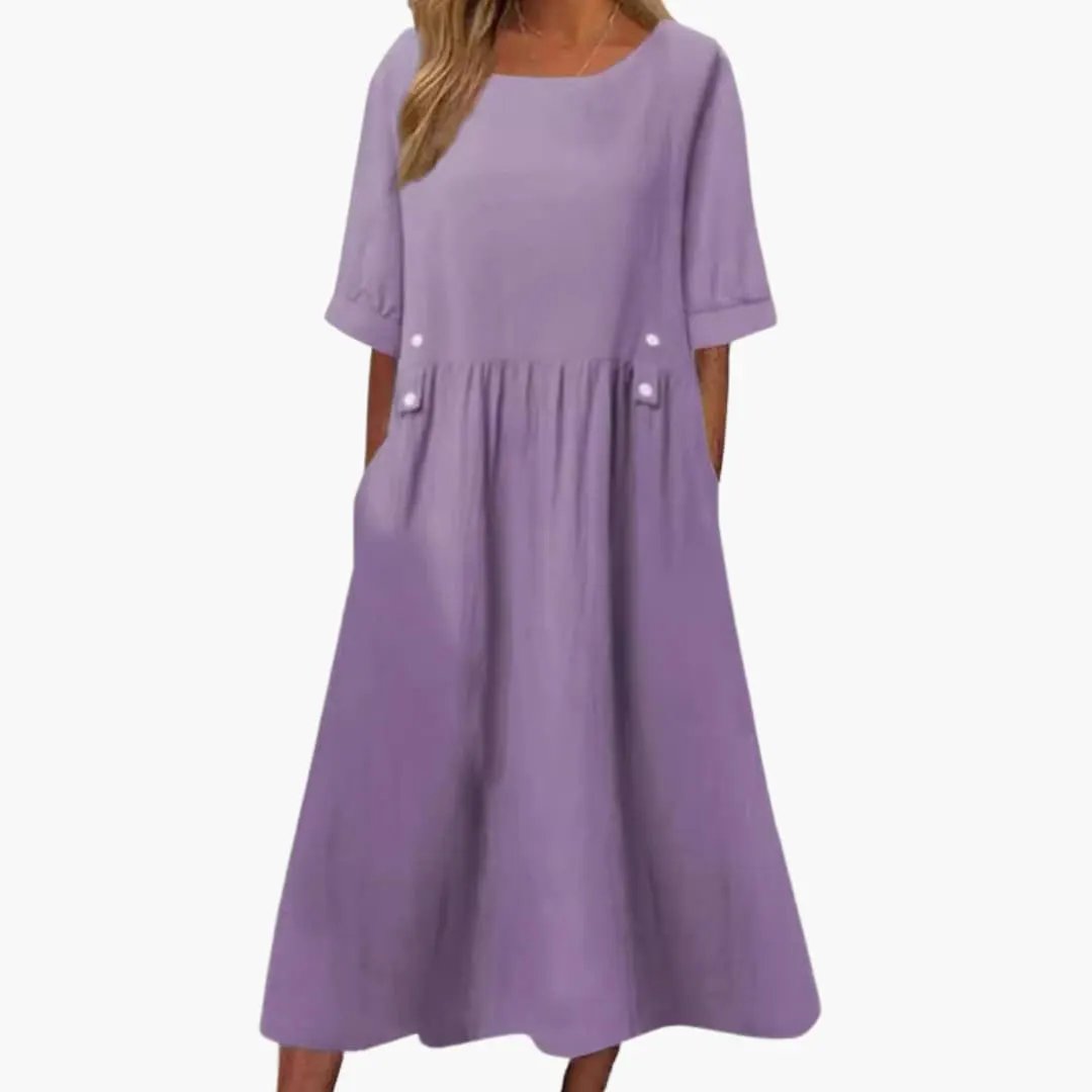 Wilfred Smith women's midi dress in lavender with round neck, loose fit, short sleeves and gathered waist.