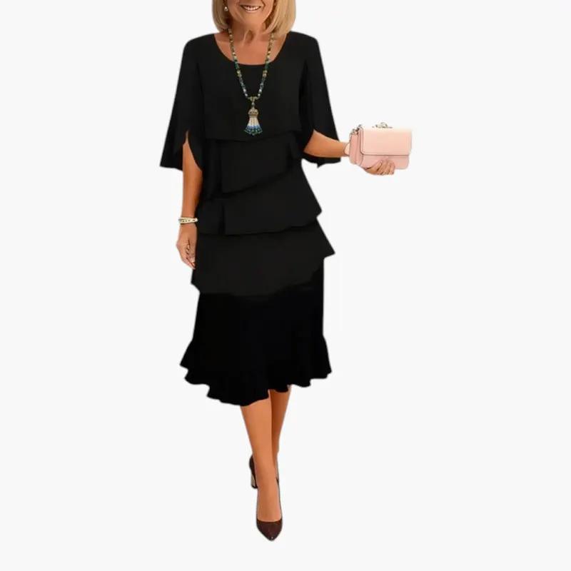 Women's black midi dress by Wilfred Smith with split sleeves and cascading ruffles