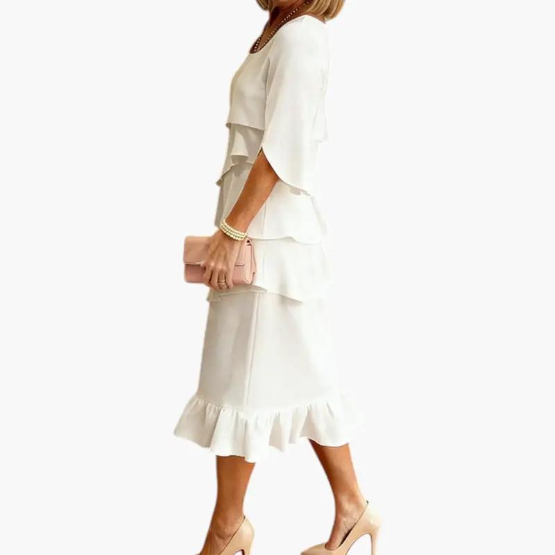 Women's midi dress with split sleeves and layered ruffles, cream color; side view.