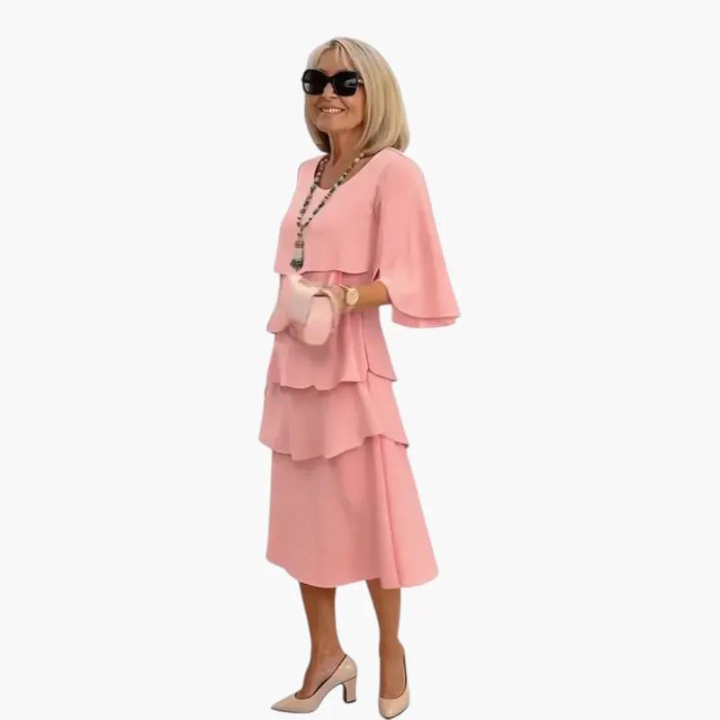 Women's pink midi dress with tiered ruffles and flutter sleeves