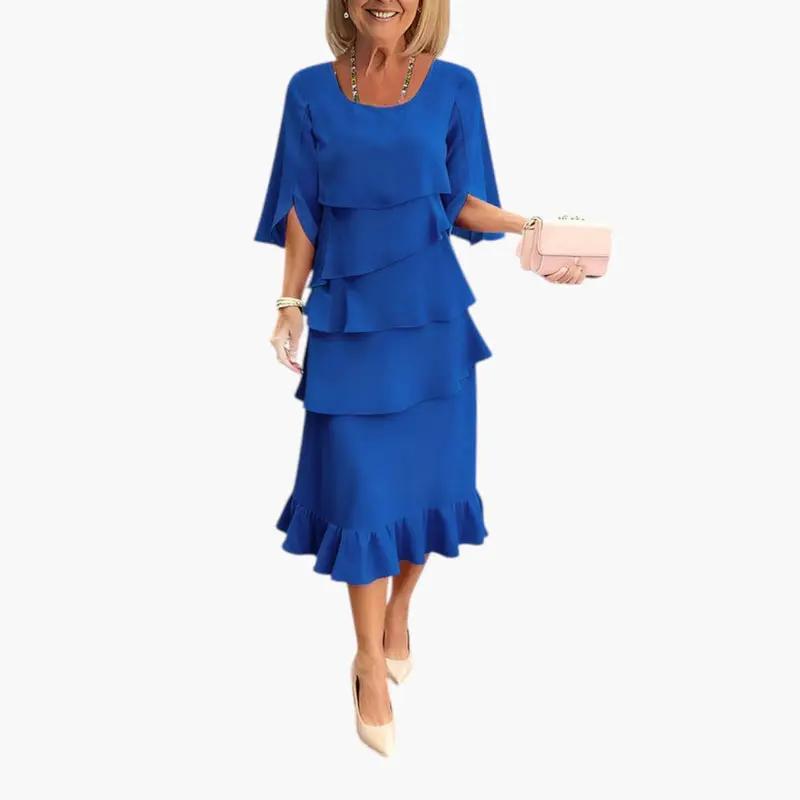 Women's blue midi dress with tiered ruffles and split sleeves.
