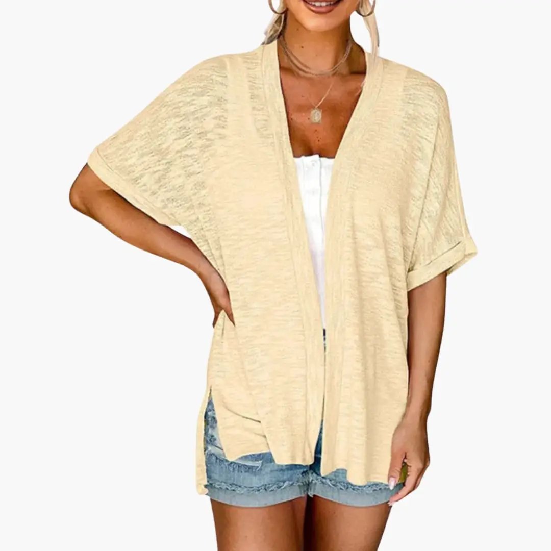 Women's open-front cardigan by Wilfred Smith in beige knit, layering top with short rolled sleeves